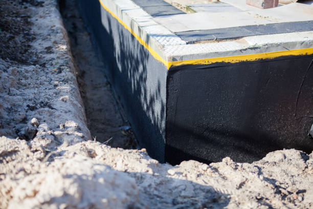 Professional Waterproofing technician working in Red Bank, SC